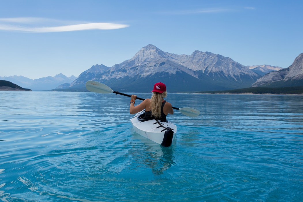 kayaking blue girl