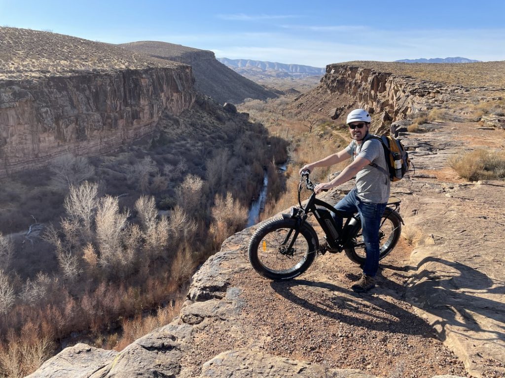 man on ebike near canyon