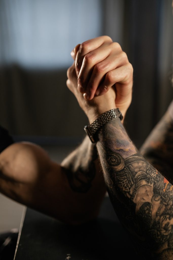 two man hands in arm wrestling grip