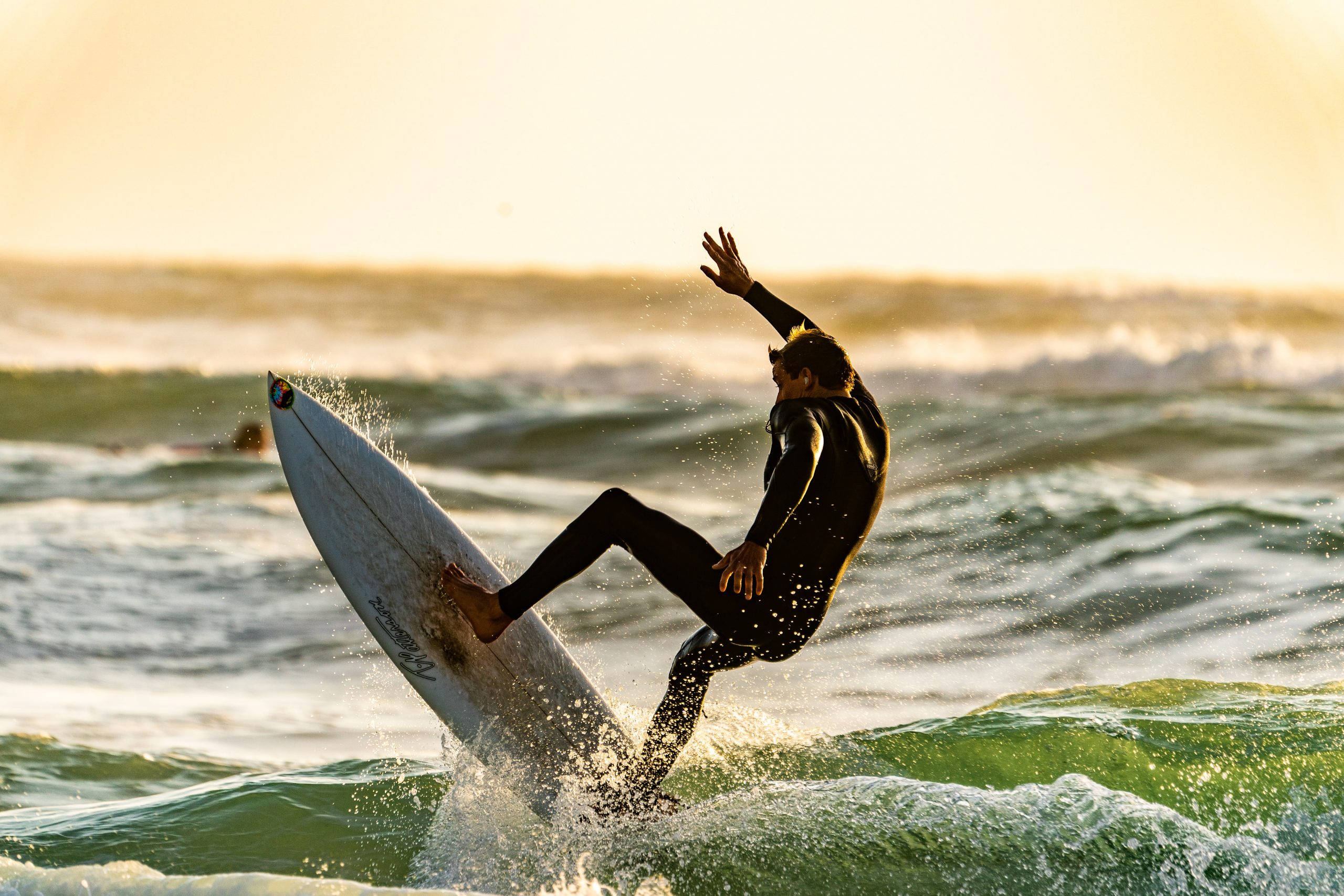 surfer under wave