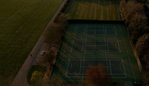 3 empty tennis courts