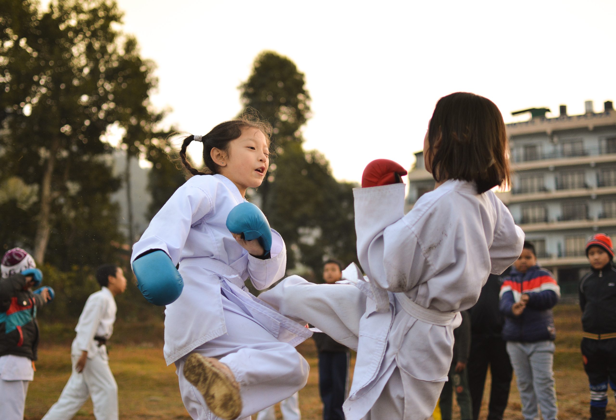 two girls practicing martial arts